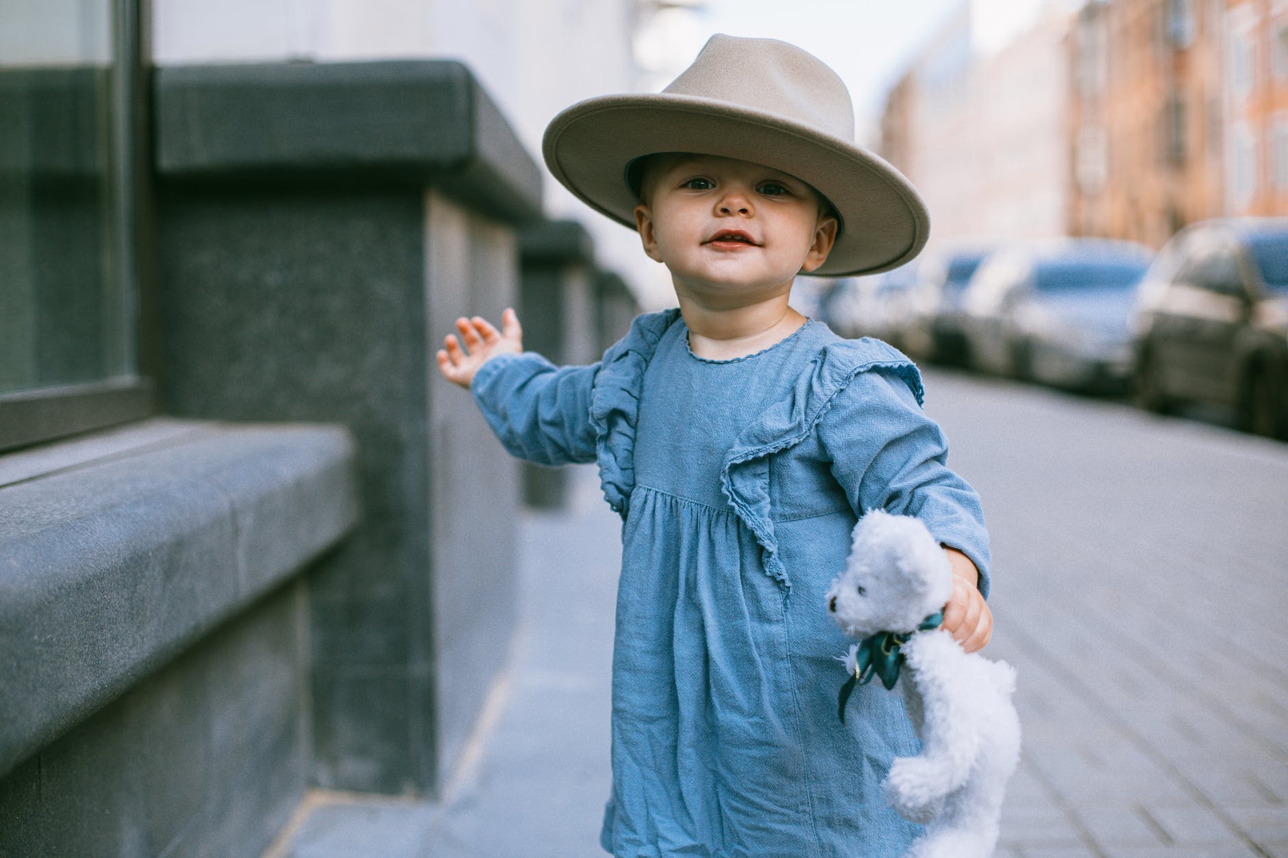 shallow focus photo of baby wearing hat
