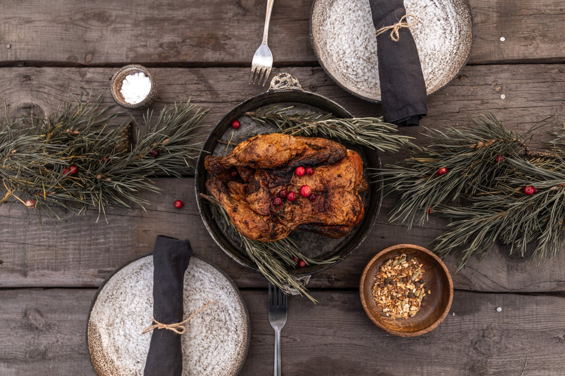 cooked turkey on black round pan