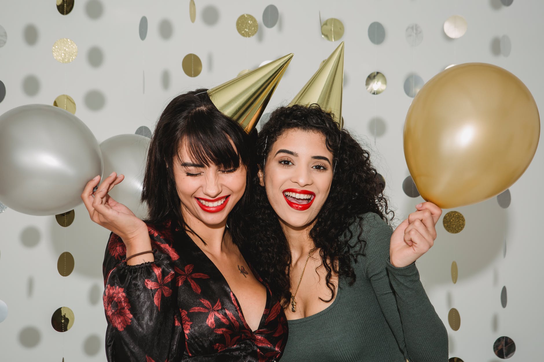 young happy women with red lips and balloons