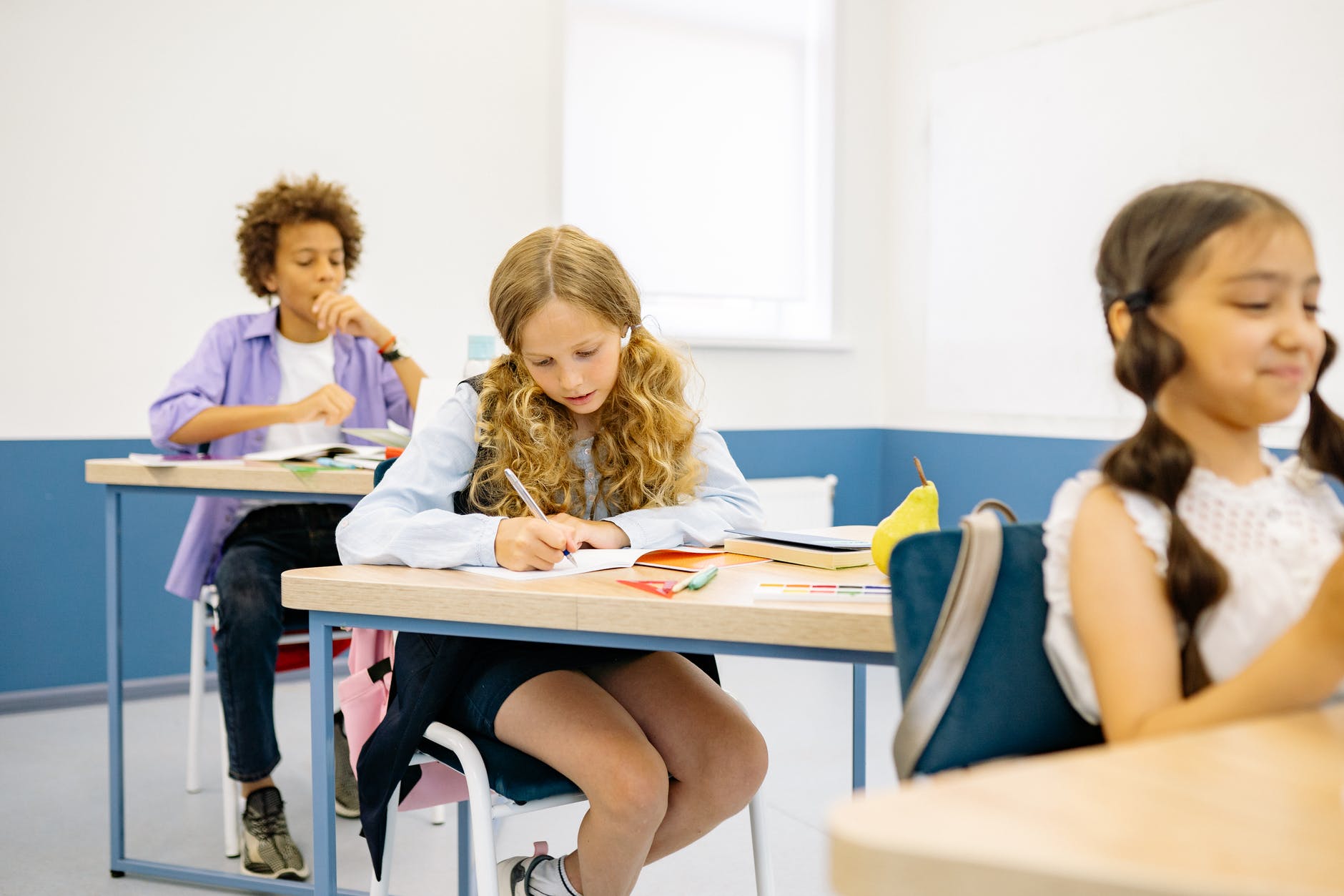 children sitting in the classroom