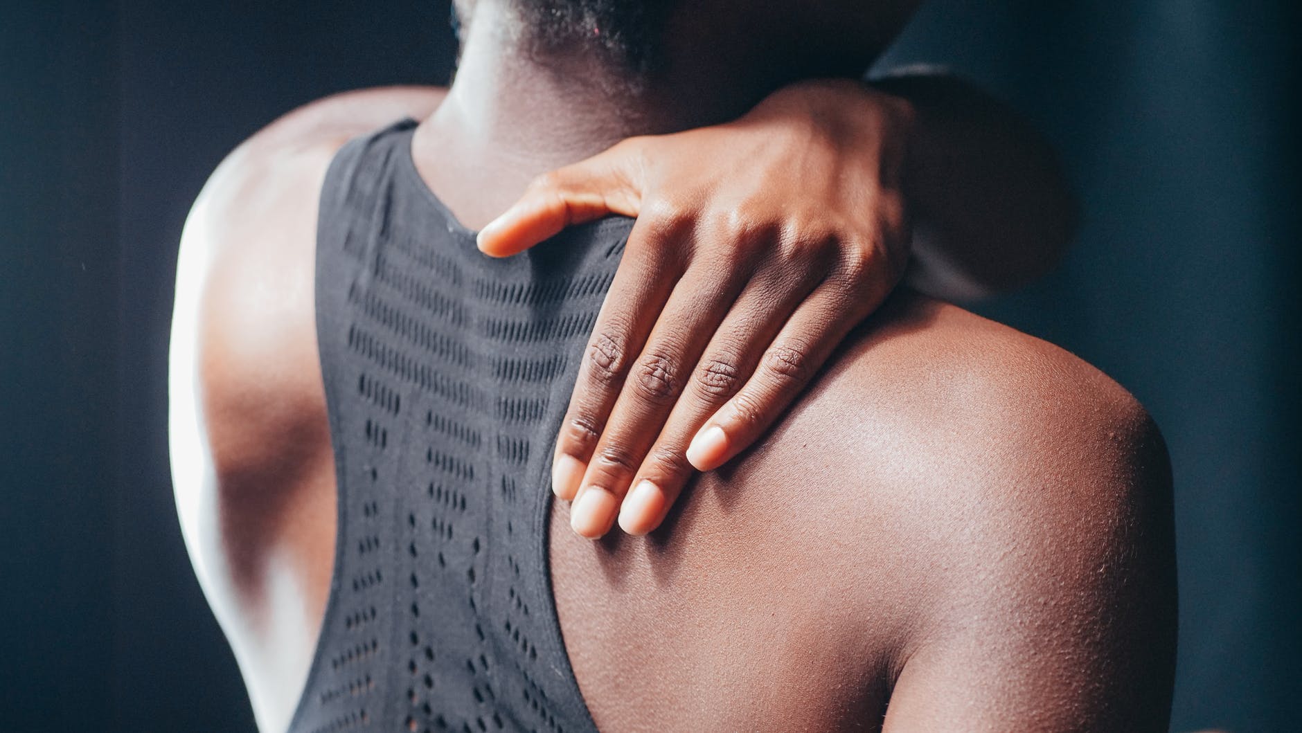 man and woman holding each others hand