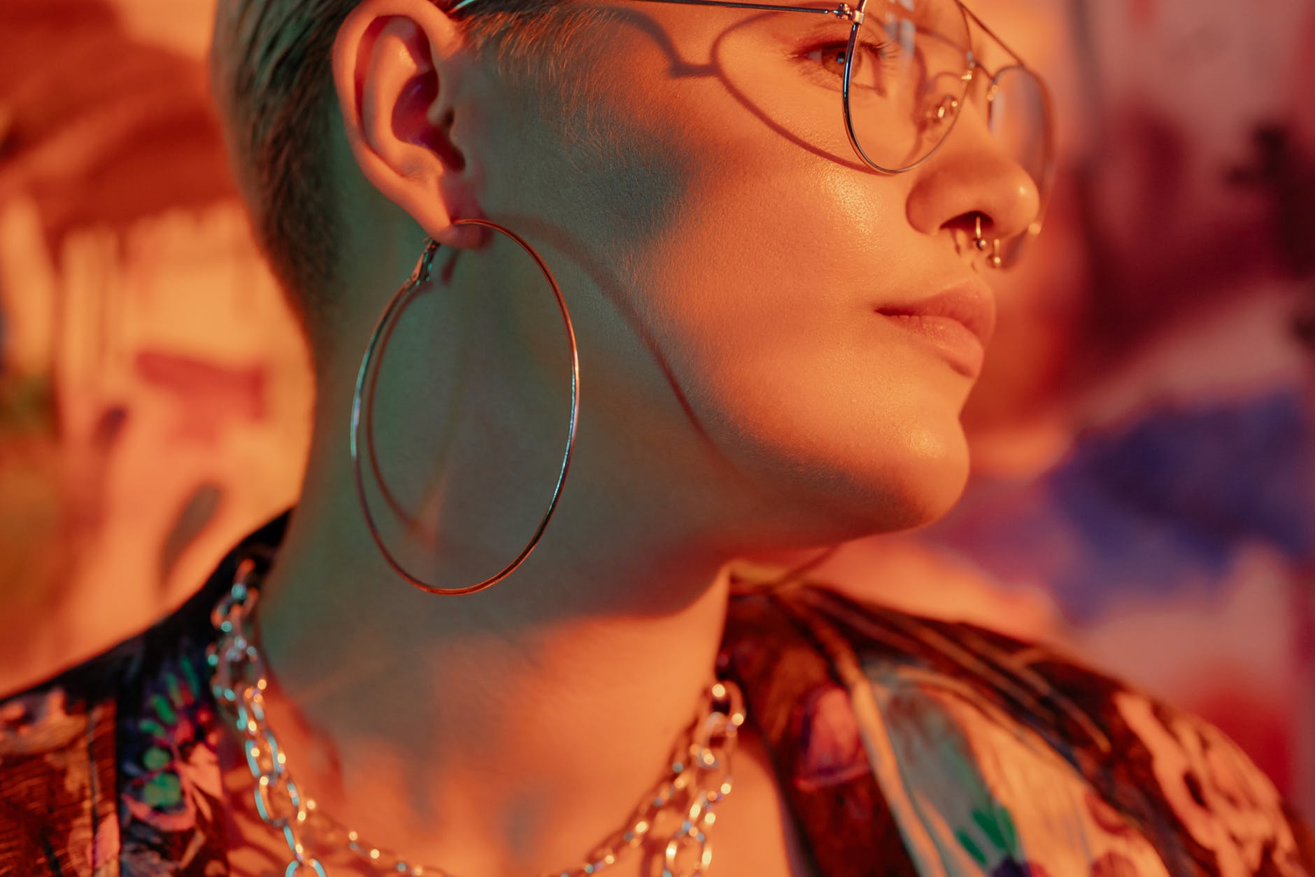 a woman wearing a hoop earing