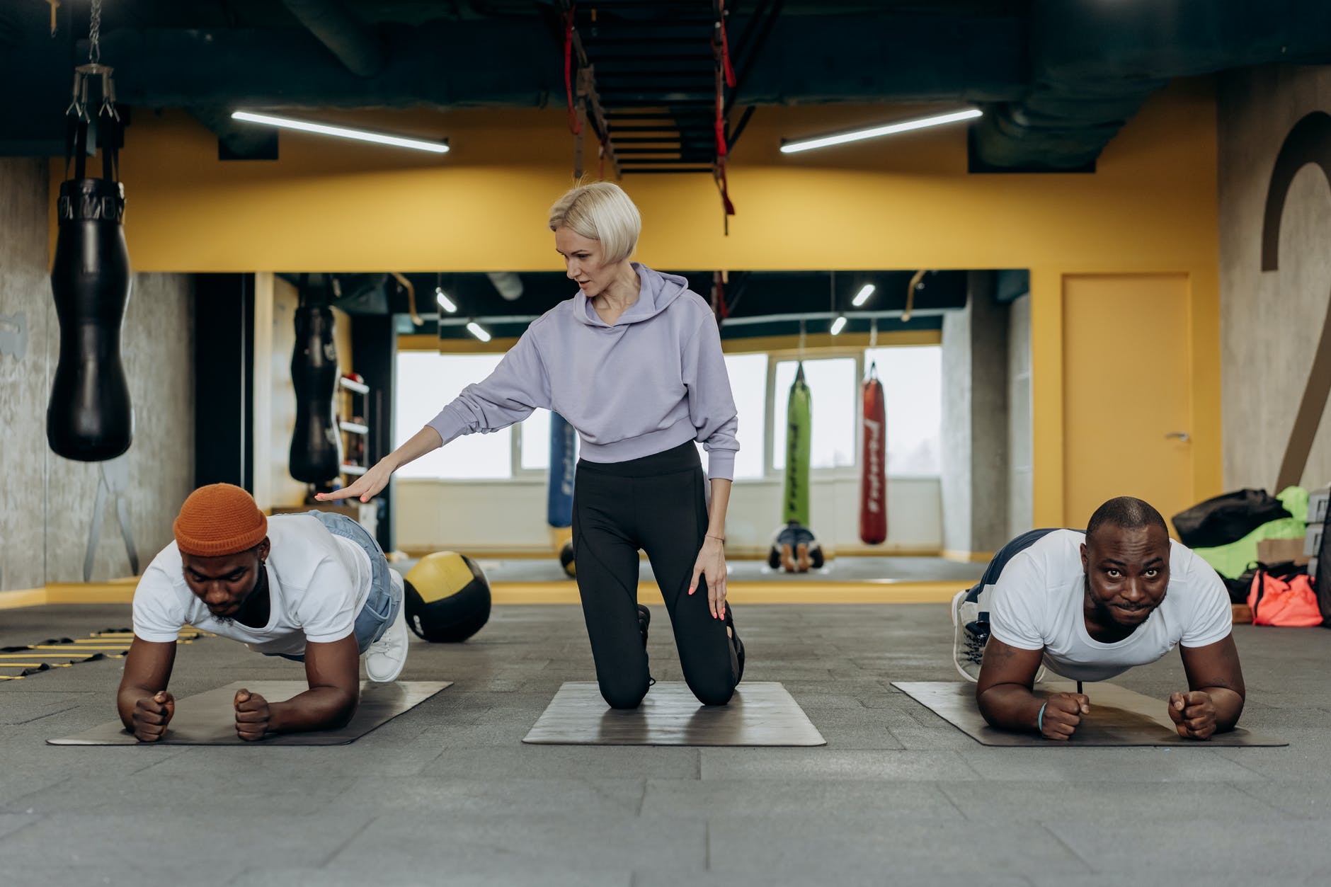 two men doing push ups
