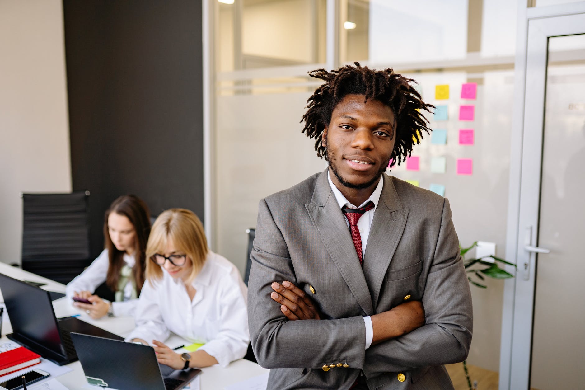 a businessman and his colleagues in the office