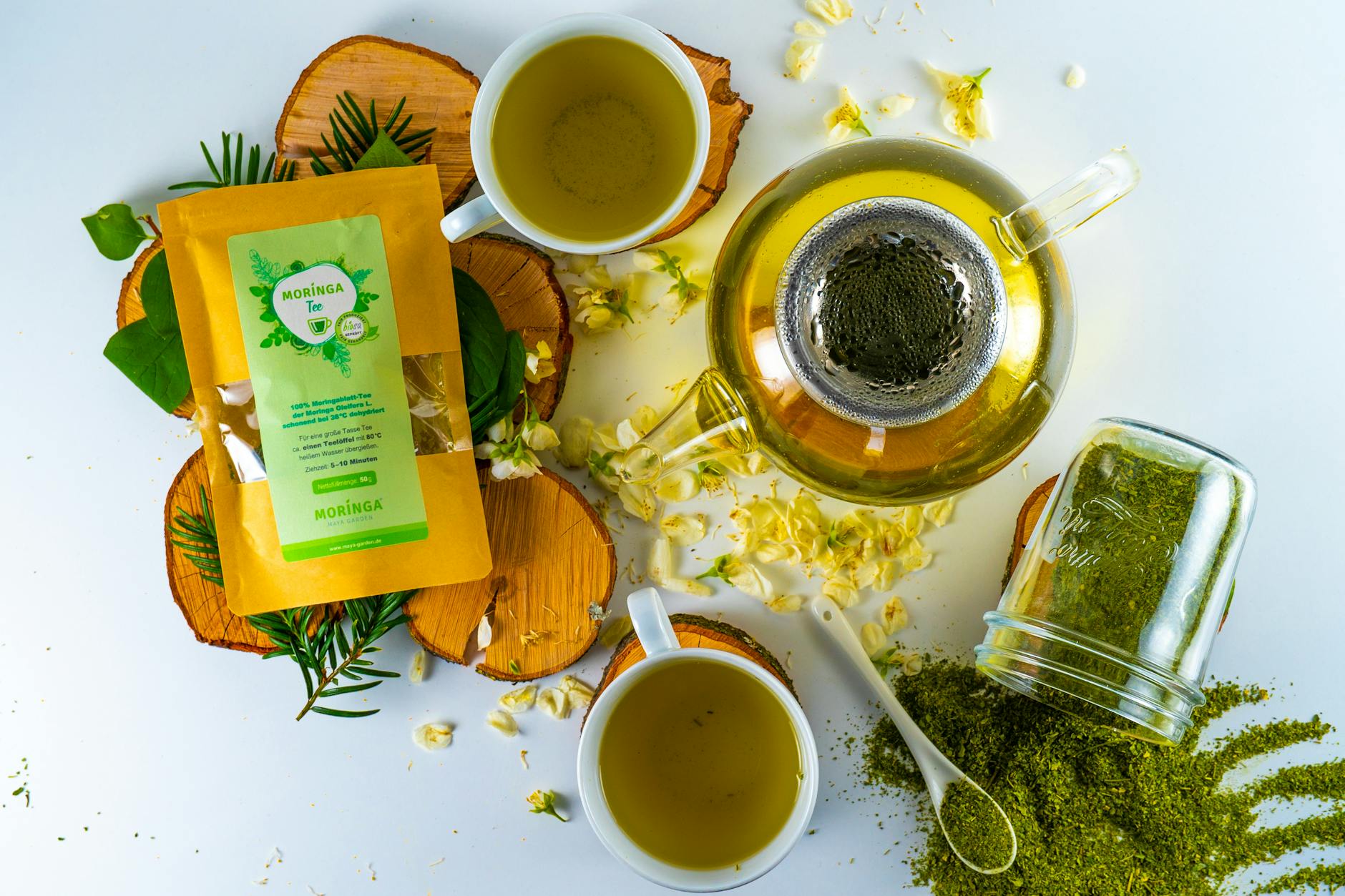 moringa tea on white surface